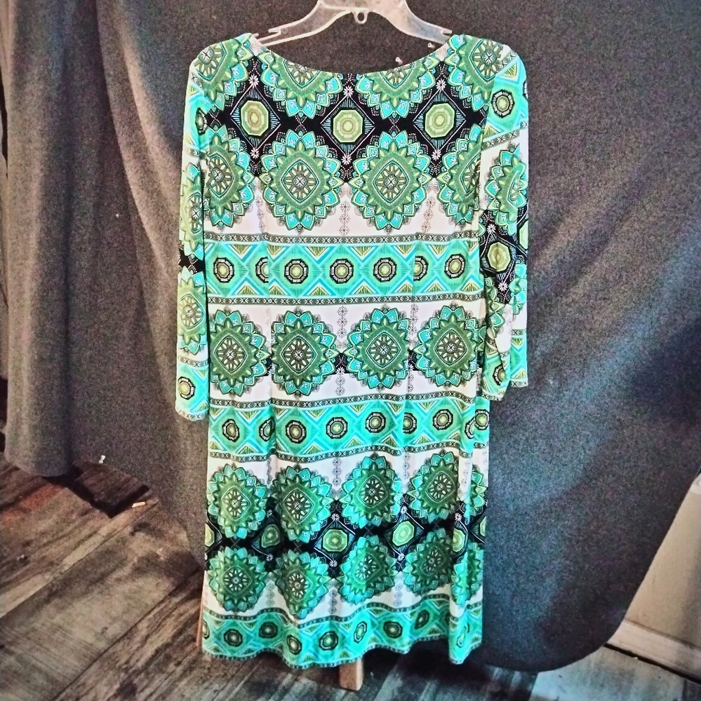 Long shirt or be worn as a dress kinda small for a size 14